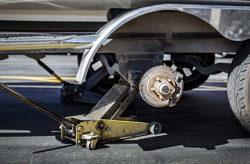 How to change a tire on a double axle travel trailer?